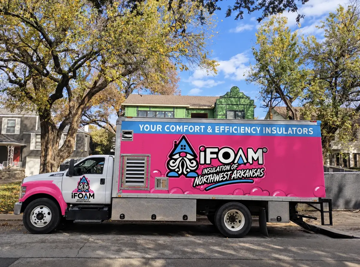 The branded iFOAM Insulation of Northwest Arkansas box truck on a residential street