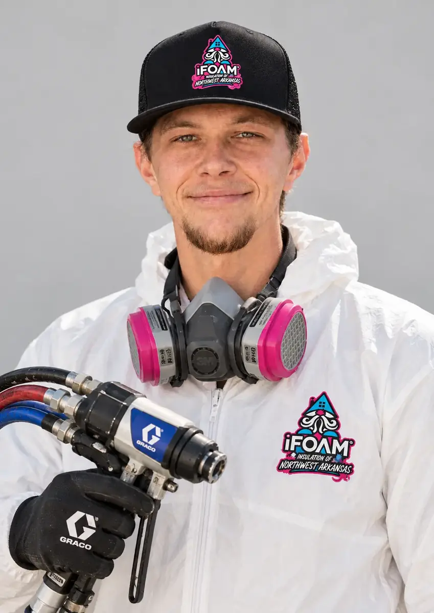 An iFOAM Insulation of Northwest Arkansas crew lead in branded uniform